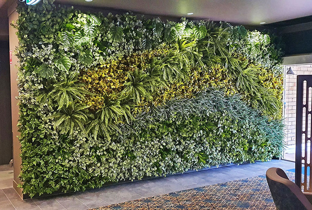 green wall at entrance says 'welcome'