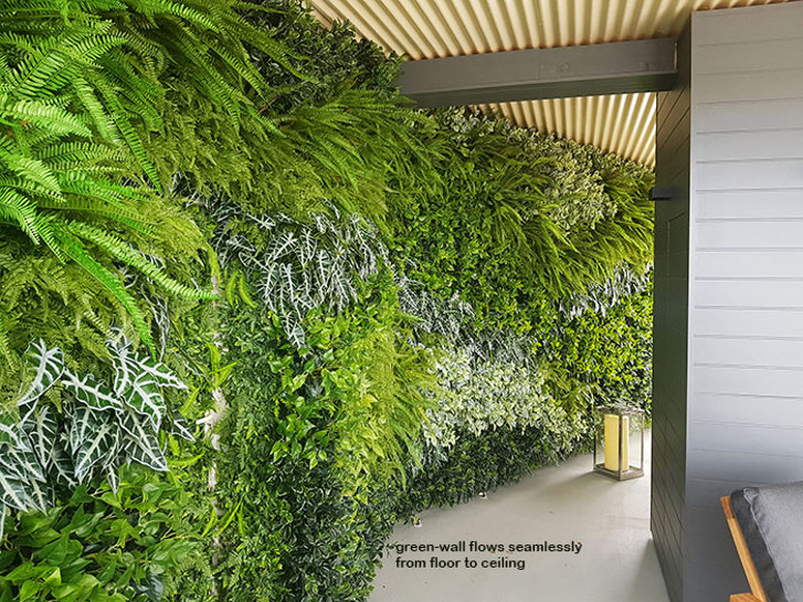 Artificial Green Walls installed over mixture of surfaces & angles to create a seamless flow...