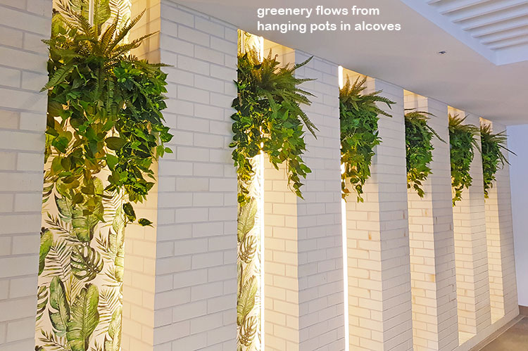 trailing greenery bowls in entry niches 