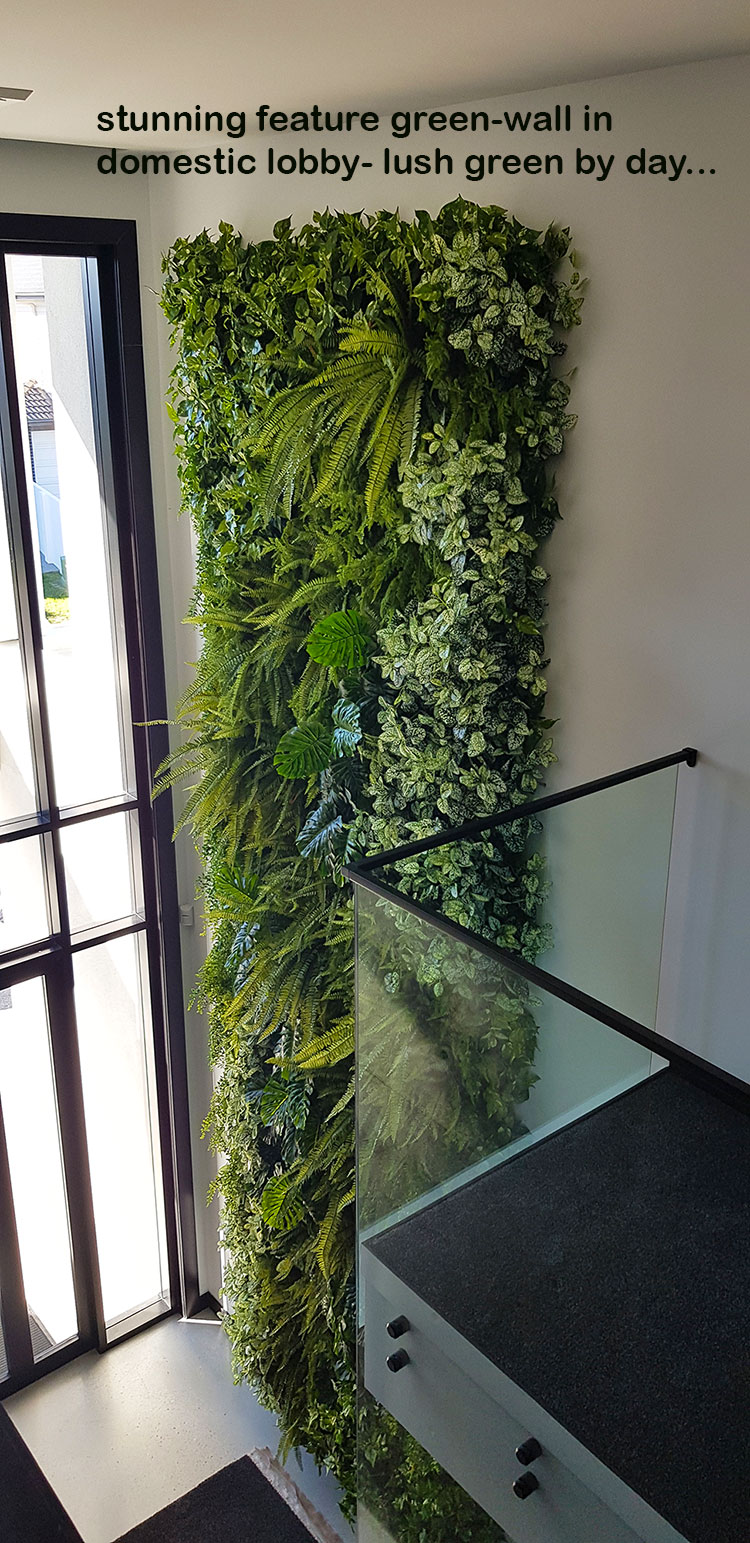 Back-lights add 'cool mood' to tall green-wall in lobby... image 2