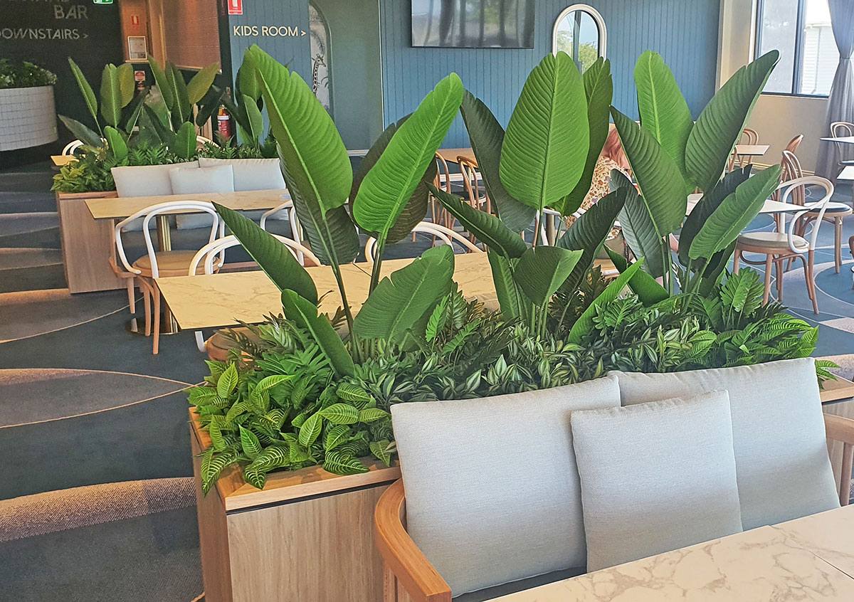 privacy planters [taller] in Club Dining area  