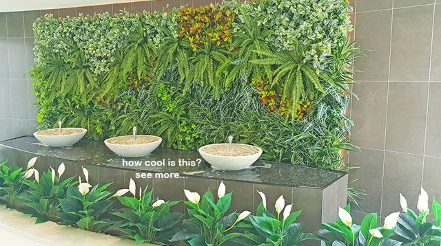 artificial plants are solution for tranquil Foyer Fountain setting...