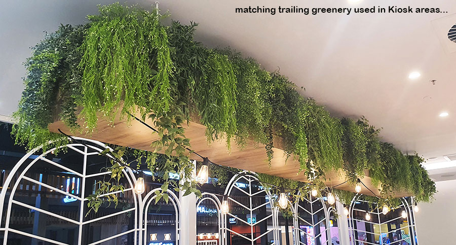 New Shopping Precinct's effective use of overhead Greenery...