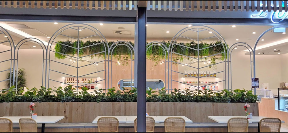 New Shopping Precinct's effective use of overhead Greenery...