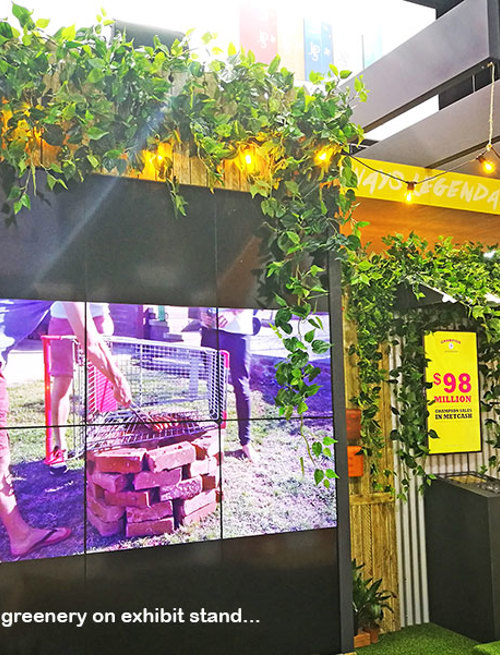 Artificial Greenery to theme on exhibition display booth...