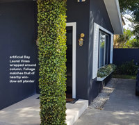UV-treated artificial plants dress-up commercial building facade...