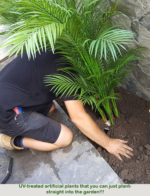 Planting artificial plants straight into the garden outdoors!!!