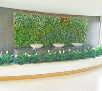 artificial plants are solution for tranquil Foyer Fountain setting...