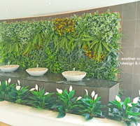 artificial plants are solution for tranquil Foyer Fountain setting...