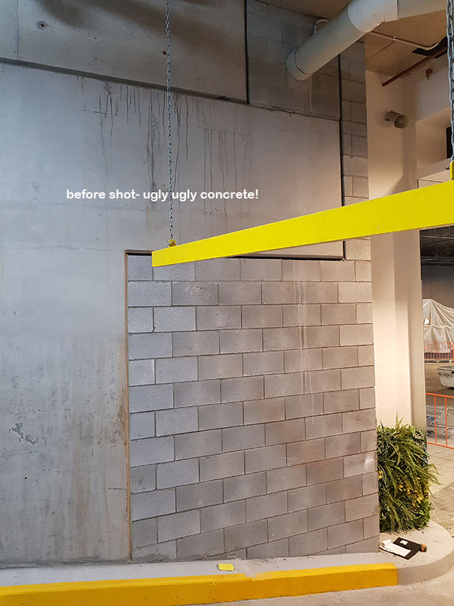 Artificial Green Walls turn concrete canyon into a porte cochere