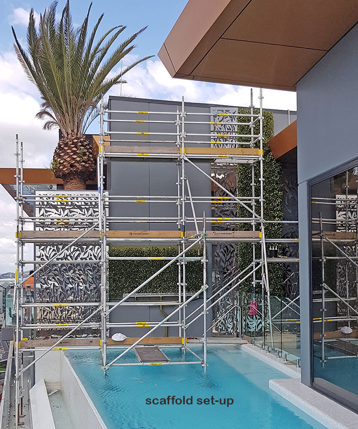 Artificial Green Wall above Penthouse Pool- tricky install!