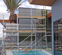 Artificial Green Wall above Penthouse Pool- tricky install!
