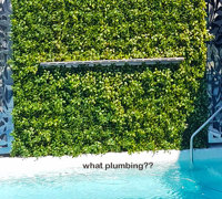 Artificial Green Wall above Penthouse Pool- tricky install!