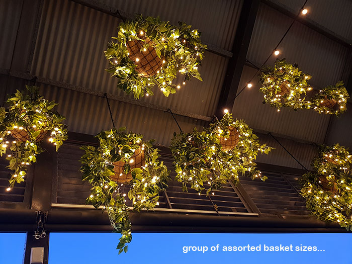 Hanging-Baskets with lights brighten up marina restaurant...