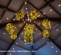 Hanging-Baskets with lights brighten up marina restaurant...