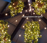Hanging-Baskets with lights brighten up marina restaurant...