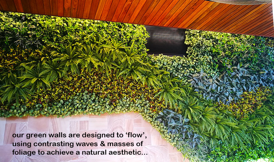 Artificial Green Wall flows seamlessly from outdoors into club foyer