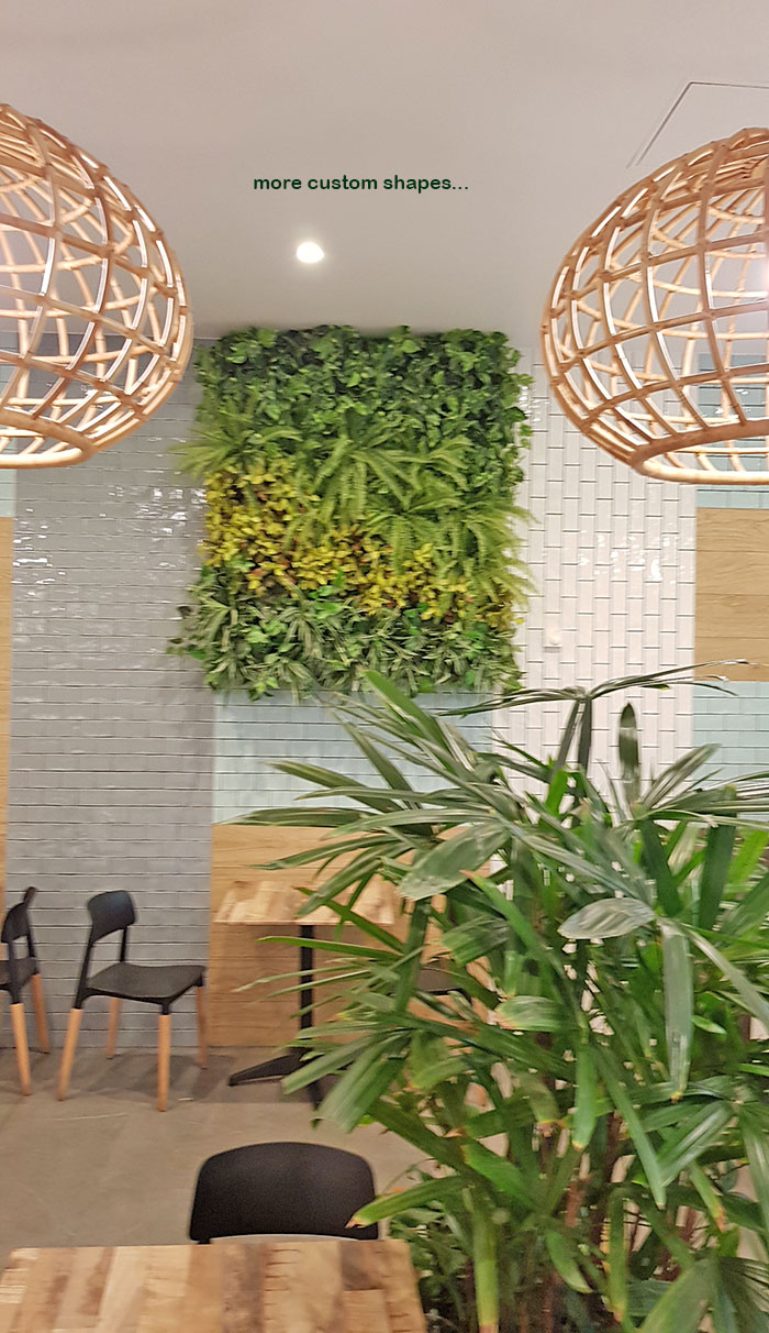 Custom-sized to fit architecture, artificial green-walls are cool!