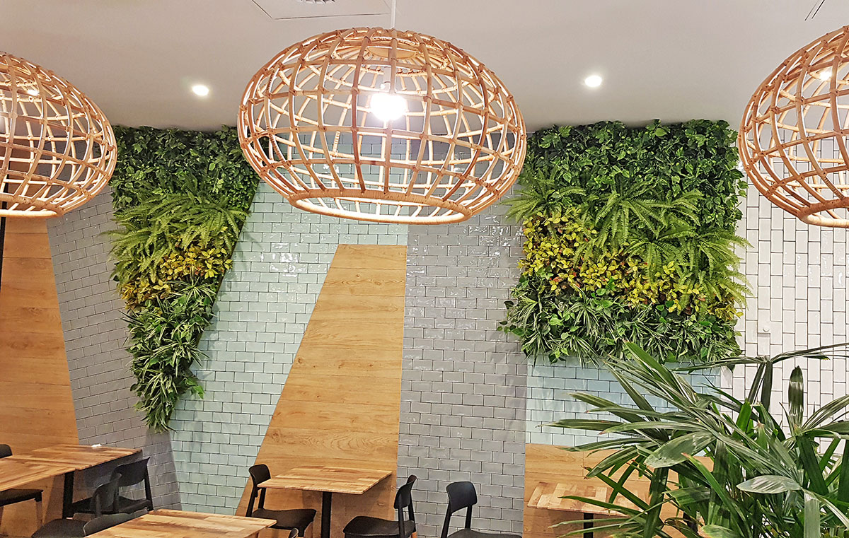 Custom-sized to fit architecture, artificial green-walls are cool!
