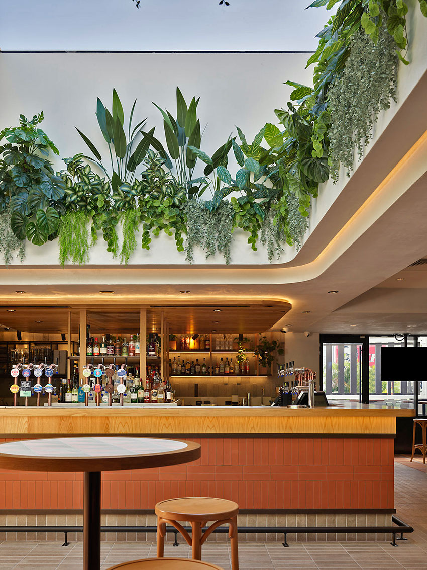 Impressive Tavern Refurb using Artificial Greenery overhead effectively...