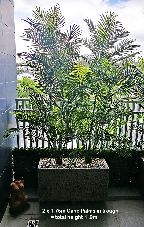Green balcony privacy screen with UV-treated palms