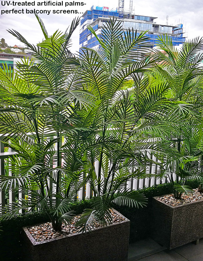 Green balcony privacy screen with UV-treated palms