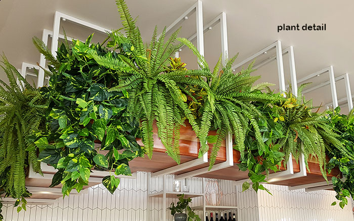 New Tavern uses artificial greenery- lots!
