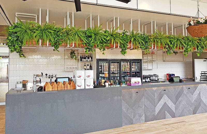 New Tavern uses artificial greenery- lots!