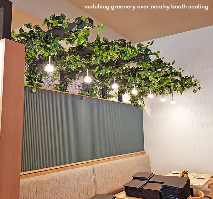New Tavern uses artificial greenery- lots!