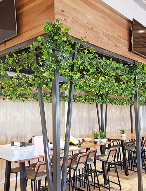 New Tavern uses artificial greenery- lots!