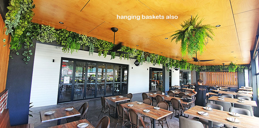 Very latest artificial greenery ideas used to lift Shopping Cnt Dining Precinct...