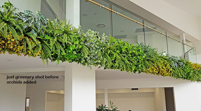 Long Green-Wall softens & brightens-up modern sales office...