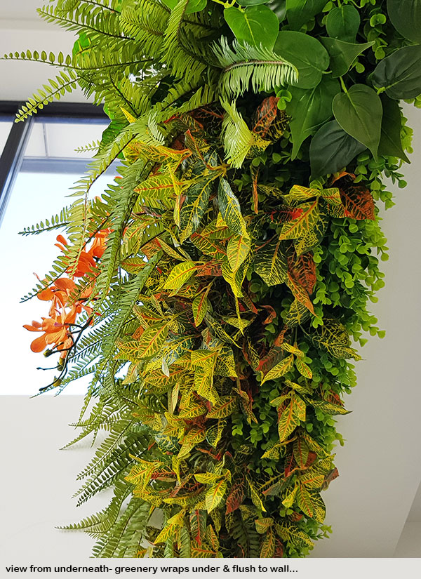 Long Green-Wall softens & brightens-up modern sales office...