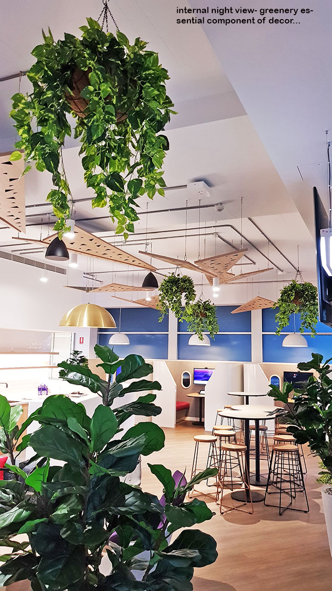 Green accents help unify adjacent office spaces...