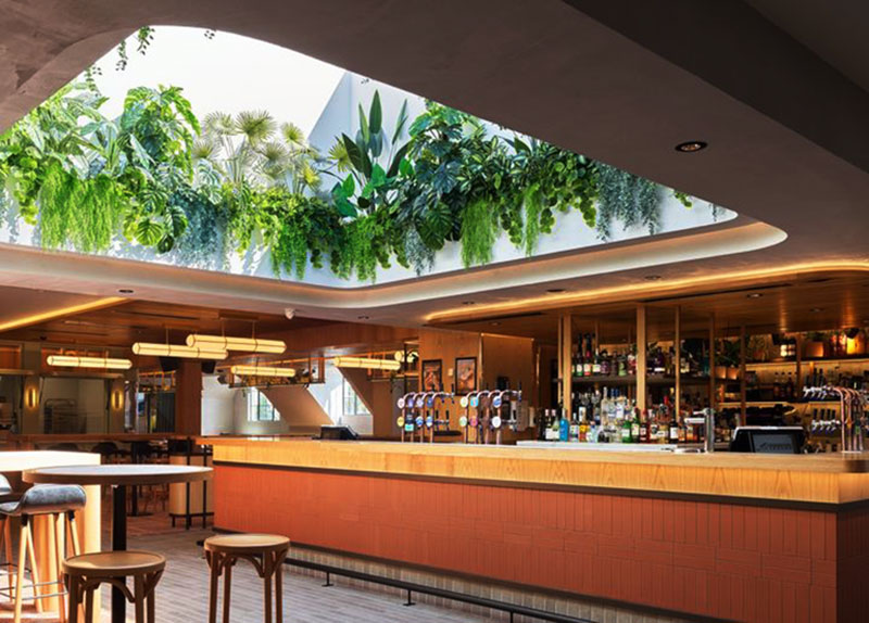 Impressive Tavern Refurb using Artificial Greenery overhead effectively... image 11