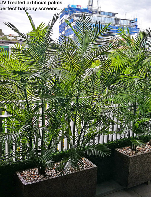 Green balcony privacy screen with UV-treated palms