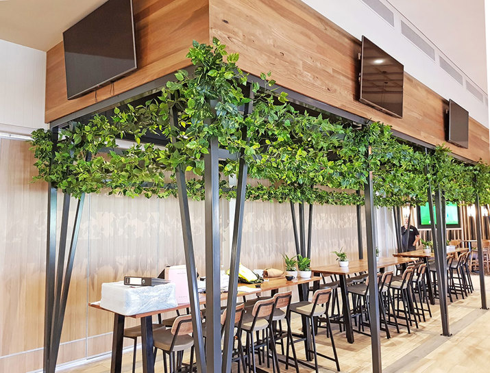 New Tavern uses artificial greenery- lots!