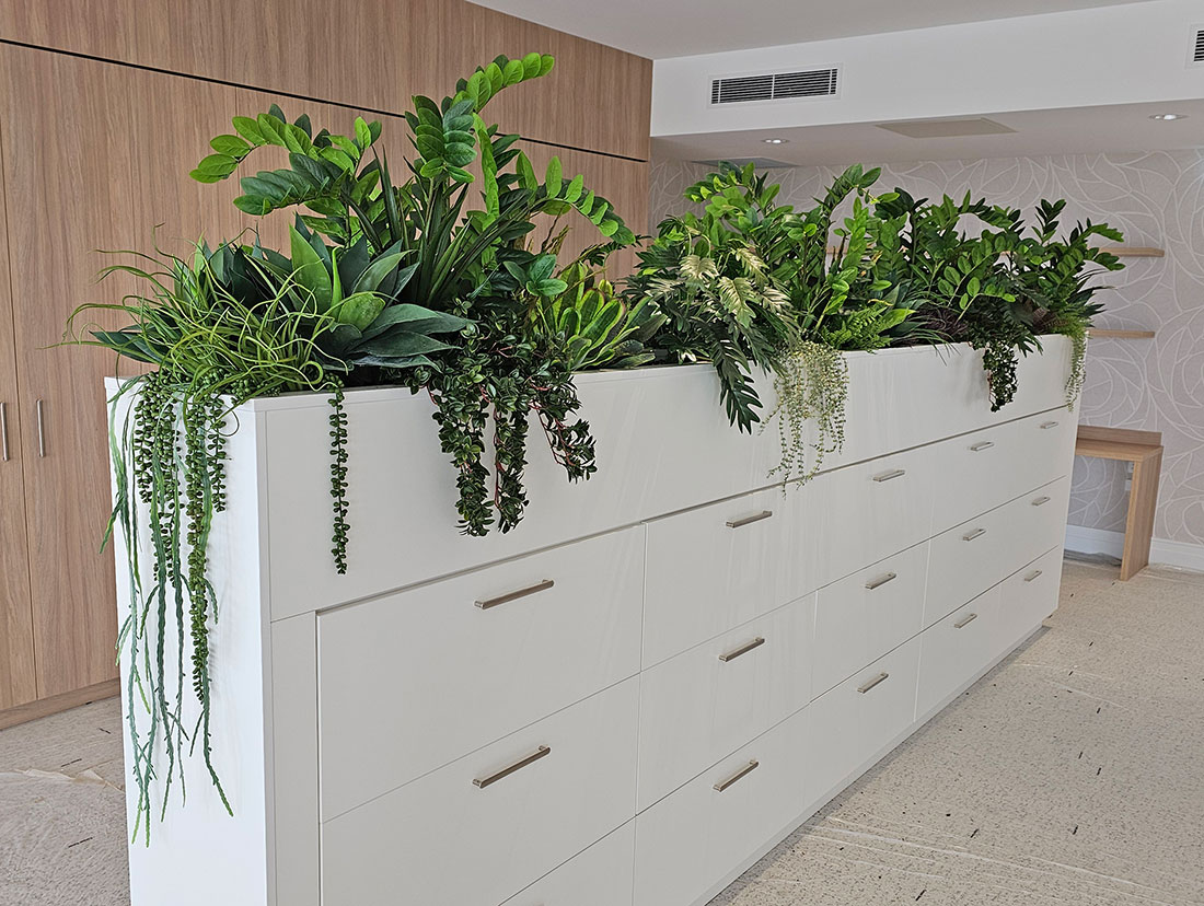 Assorted greenery 'freshens' filing cabinets
